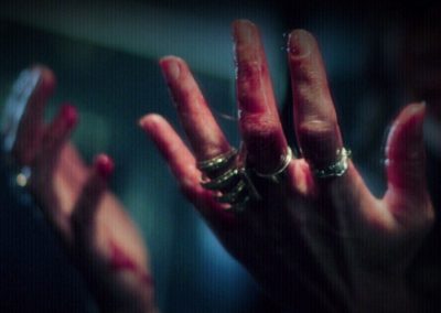 trailer still- hands